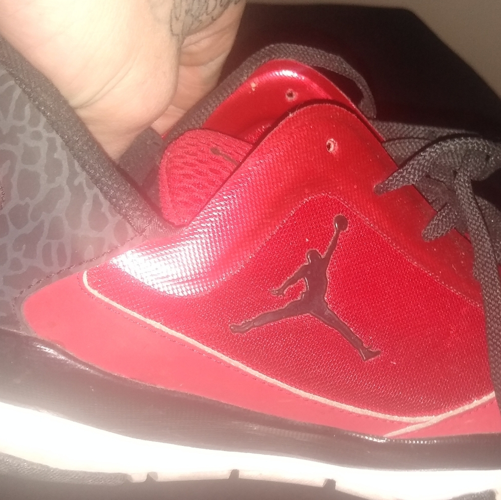 Red Jordans low top size 9